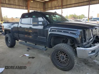 2015 Chevrolet Silverado 1500 LT with VIN 1GCRCREC3FZ209288, listed as a Copart auction lot 81051574 with 191,847 mi miles and Salvage Title. Bid and sale history available at DreamBid. Image 4.
