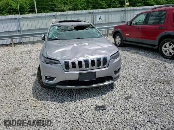 2019 Jeep Cherokee Limited z VIN 1C4PJMDX6KD139989, wystawiony jako Copart lot #54819445 z przebiegiem 119 077 mil mil oraz Szkoda całkowita • Salvage title. Historia ofert i sprzedaży dostępna na DreamBid. Obrazek 14.