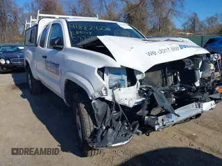 2020 Toyota Tacoma SR with VIN 5TFRX5GN1LX177797, listed as a IAAI auction lot 41882427 with 107,787 mi miles and . Bid and sale history available at DreamBid. Image 18.