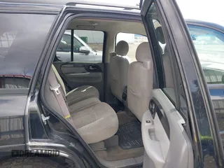 2005 GMC Envoy SLE with VIN 1GKDT13S552212811, listed as a IAAI auction lot 41996953 with 147,896 mi miles. Bid and sale history available at carsss.com. Image 8.