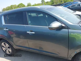 2015 Kia Sportage EX with VIN KNDPCCAC3F7720683, listed as a IAAI auction lot 42390430 with 102,867 mi miles and . Bid and sale history available at DreamBid. Image 14.