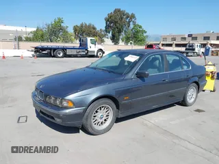 2000 BMW 5 Series 528iA with VIN WBADM634XYGU07427, listed as a IAAI auction lot 42085048 with 192,828 mi miles. Bid and sale history available at carsss.com. Image 6.