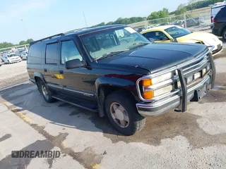 1999 Chevrolet Suburban z VIN 3GNFK16R3XG131968, wystawiony jako IAAI lot #42499715 z przebiegiem 149 764 mil mil oraz . Historia ofert i sprzedaży dostępna na DreamBid. Obrazek 1.