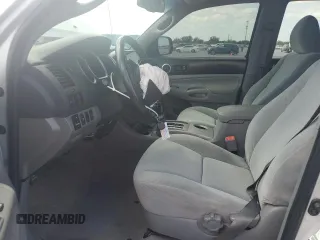 2010 Toyota Tacoma PreRunner with VIN 3TMKU4HN1AM025931, listed as a Copart auction lot 54336905 with 184,868 mi miles and Salvage title. Bid and sale history available at DreamBid. Image 7.