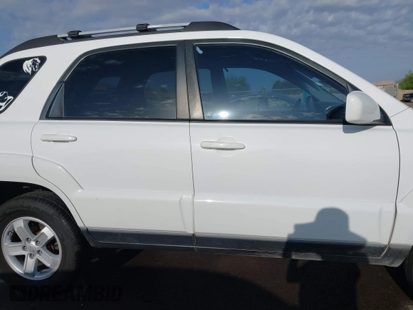 2009 Kia Sportage LX with VIN KNDJF723197622517, listed as a IAAI auction lot 41771268 with 127,112 mi miles. Bid and sale history available at carsss.com. Image 14.