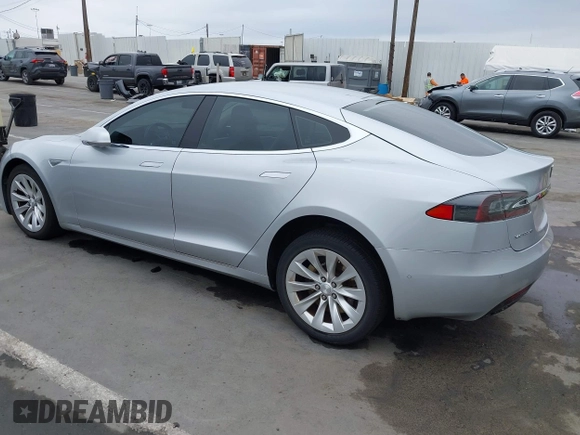 2016 Tesla Model S 90D with VIN 5YJSA1E23GF138925, listed as a IAAI auction lot 42408676 with 48,399 mi miles and . Bid and sale history available at DreamBid. Image 3.