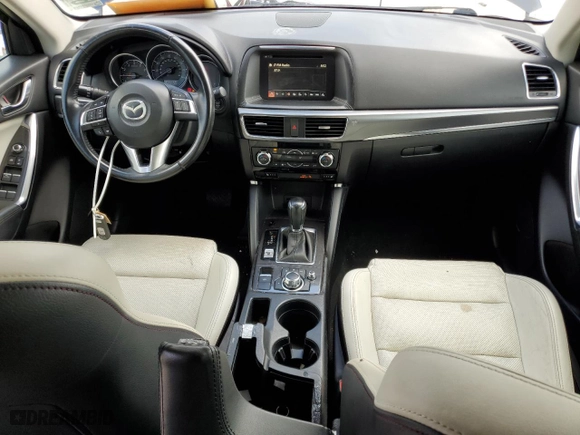 2016 Mazda CX-5 Grand Touring with VIN JM3KE4DY6G0657291, listed as a Copart auction lot 69763144 with 122,312 mi miles and Salvage Title. Bid and sale history available at carsss.com. Image 8.