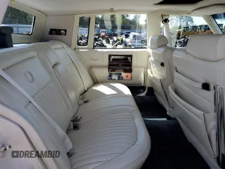 1990 Cadillac Brougham z VIN 1G6DW5479LR709291, wystawiony jako Copart lot #50173935 z przebiegiem 53 477 mil mil oraz Tytuł czysty. Historia ofert i sprzedaży dostępna na DreamBid. Obrazek 10.