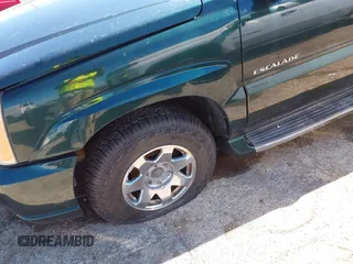 2003 Cadillac Escalade z VIN 1GYEK63N83R123971, wystawiony jako IAAI lot #41814808 z przebiegiem 235 724 mil mil oraz . Historia ofert i sprzedaży dostępna na DreamBid. Obrazek 6.