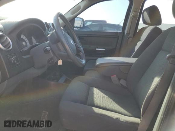 2006 Mitsubishi Raider z VIN 1Z7HT38K76S574856, wystawiony jako Copart lot #74367324 z przebiegiem 176 611 mil mil oraz Czysty tytuł • Clean title. Historia ofert i sprzedaży dostępna na DreamBid. Obrazek 7.