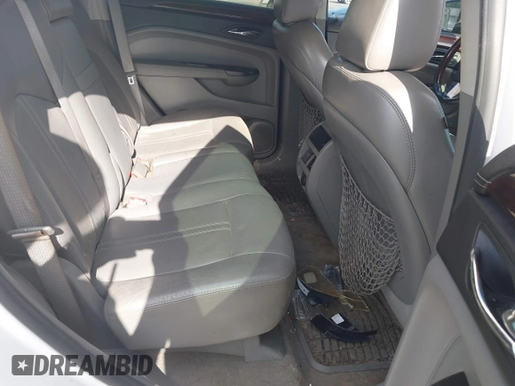 2012 Cadillac SRX Performance Collection with VIN 3GYFNBE34CS659748, listed as a IAAI auction lot 42693814 with 216,854 mi miles and . Bid and sale history available at DreamBid. Image 8.