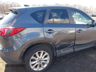 2013 Mazda CX-5 Grand Touring with VIN JM3KE4DE1D0164488, listed as a IAAI auction lot 41683326 with 129,989 mi miles. Bid and sale history available at carsss.com. Image 17.