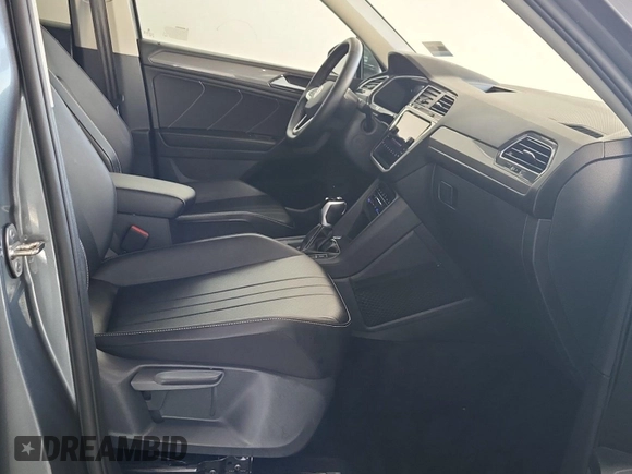 2024 Volkswagen Tiguan SE with VIN 3VV3B7AX8RM107014, listed as a IAAI auction lot 42734341 with 27,789 mi miles and . Bid and sale history available at DreamBid. Image 53.