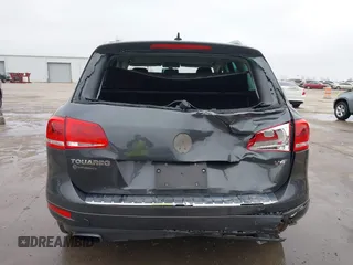 2012 Volkswagen Touareg Sport with VIN WVGEF9BP9CD008545, listed as a IAAI auction lot 41492653 with 138,424 mi miles and . Bid and sale history available at DreamBid. Image 17.