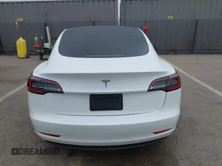 2023 Tesla Model 3 with VIN 5YJ3E1EA5PF505856, listed as a IAAI auction lot 41885837 with 28,206 mi miles and . Bid and sale history available at carsss.com. Image 15.