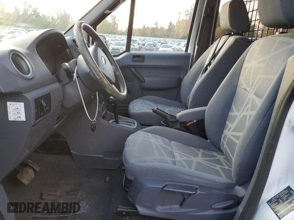 2013 Ford Transit Connect XL with VIN NM0LS6AN2DT141934, listed as a Copart auction lot 82060284 with 104,878 mi miles and Salvage Title. Bid and sale history available at carsss.com. Image 7.