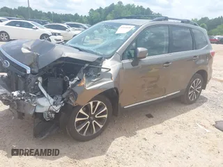2017 Subaru Forester Touring with VIN JF2SJGWCXHH558789, listed as a IAAI auction lot 42518698 with 112,294 mi miles and . Bid and sale history available at DreamBid. Image 17.