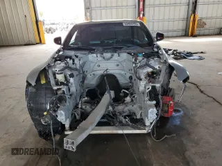 2015 Nissan 370Z Nismo z VIN JN1AZ4EH1FM441060, wystawiony jako Copart lot #53423725 z przebiegiem Nie podano mil oraz Szkody całkowita. Historia ofert i sprzedaży dostępna na DreamBid. Obrazek 5.
