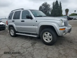 2002 Jeep Liberty Limited with VIN 1J8GK58K52W303098, listed as a Copart auction lot 56005185 with 77,206 mi miles and Clean title. Bid and sale history available at DreamBid. Image 4.