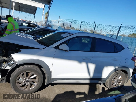 2017 Hyundai Tucson SE with VIN KM8J33A43HU464978, listed as a IAAI auction lot 41655832 with 135,359 mi miles. Bid and sale history available at carsss.com. Image 15.