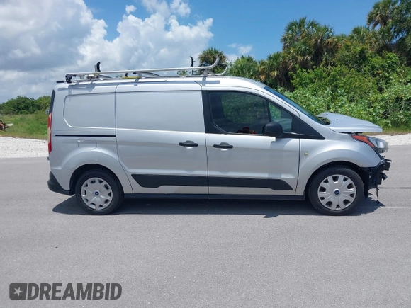 2021 Ford Transit Connect XLT z VIN NM0LS7F27M1502137, wystawiony jako IAAI lot #42273667 z przebiegiem 73 630 mil mil oraz . Historia ofert i sprzedaży dostępna na DreamBid. Obrazek 14.