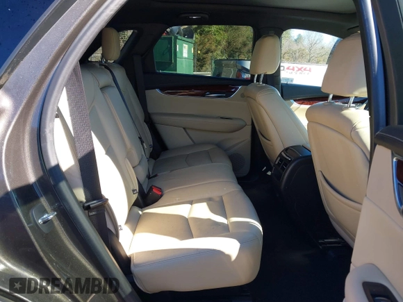 2019 Cadillac XT5 Premium Luxury FWD with VIN 1GYKNERS7KZ145993, listed as a IAAI auction lot 41619112 with 81,435 mi miles and . Bid and sale history available at DreamBid. Image 8.