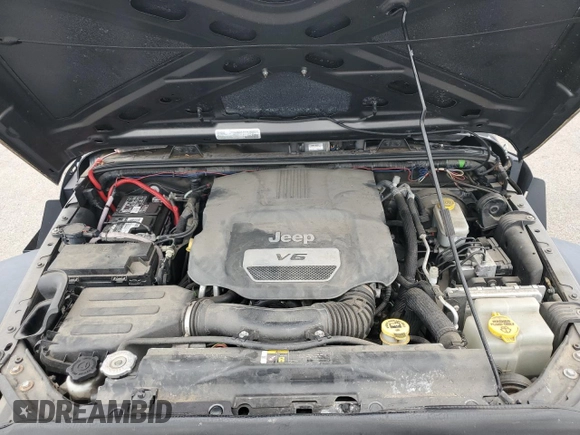 2017 Jeep Wrangler Sport with VIN 1C4GJWAG8HL608093, listed as a Copart auction lot 65006675 with 52,630 mi miles and Salvage title. Bid and sale history available at DreamBid. Image 12.