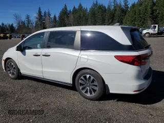2021 Honda Odyssey EX-L with VIN 5FNRL6H79MB043486, listed as a Copart auction lot 51002515 with 47,998 mi miles and Salvage Title. Bid and sale history available at DreamBid. Image 2.