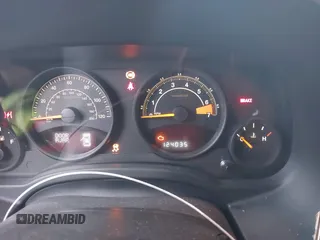 2014 Jeep Patriot Latitude with VIN 1C4NJPFA3ED618523, listed as a IAAI auction lot 41108657 with 124,035 mi miles and . Bid and sale history available at carsss.com. Image 7.