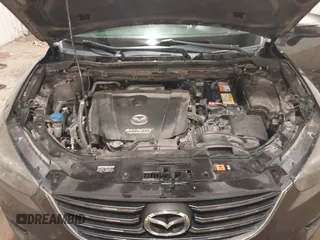 2016 Mazda CX-5 Grand Touring with VIN JM3KE4DY0G0732843, listed as a IAAI auction lot 41520889 with 149,798 mi miles. Bid and sale history available at carsss.com. Image 10.