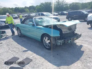 2003 Ford Thunderbird Deluxe z VIN 1FAHP60A33Y110451, wystawiony jako IAAI lot #42133863 z przebiegiem Nie podano mil oraz . Historia ofert i sprzedaży dostępna na DreamBid. Obrazek 1.