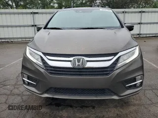 2018 Honda Odyssey Elite z VIN 5FNRL6H94JB107589, wystawiony jako Copart lot #58347385 z przebiegiem 98 761 mil mil oraz Szkody całkowita. Historia ofert i sprzedaży dostępna na DreamBid. Obrazek 5.