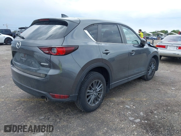 2021 Mazda CX-5 Touring with VIN JM3KFACM1M0461510, listed as a IAAI auction lot 41660439 with 30,352 mi miles. Bid and sale history available at carsss.com. Image 4.