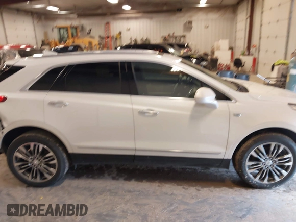 2019 Cadillac XT5 Luxury AWD z VIN 1GYKNDRS3KZ149162, wystawiony jako IAAI lot #42050088 z przebiegiem 109 364 mil mil oraz . Historia ofert i sprzedaży dostępna na DreamBid. Obrazek 13.