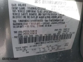 2005 Mercury Montego Premier with VIN 1MEFM42165G618285, listed as a IAAI auction lot 41595913 with 127,811 mi miles. Bid and sale history available at carsss.com. Image 9.