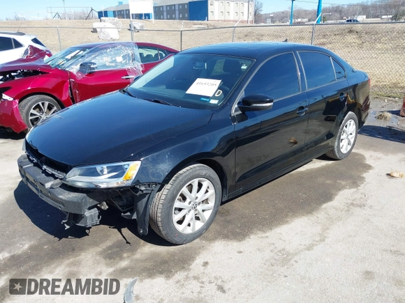 2012 Volkswagen Jetta Sedan SE w/Convenience with VIN 3VWDX7AJ4CM419447, listed as a IAAI auction lot 41653205 with 101,647 mi miles. Bid and sale history available at carsss.com. Image 2.