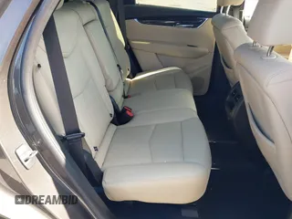 2019 Cadillac XT5 FWD with VIN 1GYKNARS5KZ143510, listed as a IAAI auction lot 41553279 with 53,943 mi miles and . Bid and sale history available at carsss.com. Image 8.