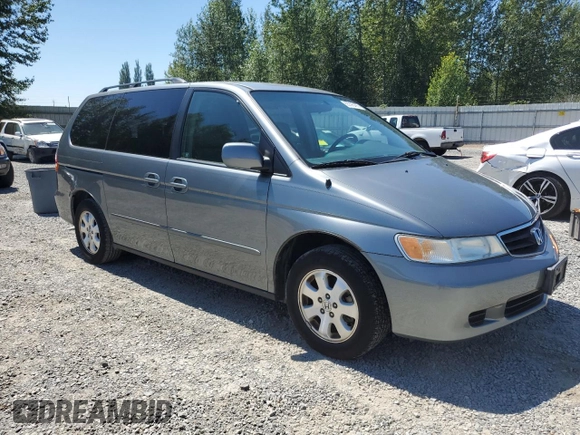 2002 Honda Odyssey EX-L with VIN 2HKRL18932H540391, listed as a Copart auction lot 65395405 with 119,239 mi miles and Clean title. Bid and sale history available at DreamBid. Image 4.