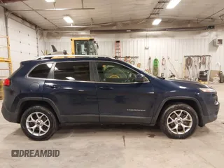 2014 Jeep Cherokee Latitude with VIN 1C4PJMCS9EW239549, listed as a IAAI auction lot 41156954 with 167,331 mi miles and . Bid and sale history available at DreamBid. Image 13.