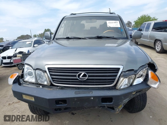 2001 Lexus LX 470 z VIN JTJHT00WX13509489, wystawiony jako IAAI lot #42227083 z przebiegiem 360 283 mil mil oraz . Historia ofert i sprzedaży dostępna na DreamBid. Obrazek 12.