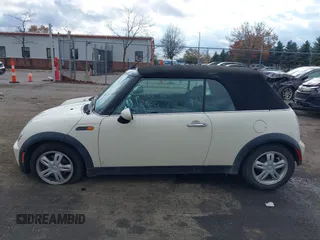 2006 MINI Convertible with VIN WMWRF33566TF65410, listed as a IAAI auction lot 40813052 with 131,109 mi miles and . Bid and sale history available at DreamBid. Image 14.