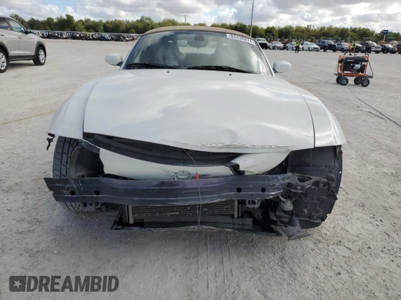 2006 BMW Z4 3.0si with VIN 4USBU53556LX00647, listed as a Copart auction lot 83436974 with 70,077 mi miles and Salvage title. Bid and sale history available at DreamBid. Image 5.
