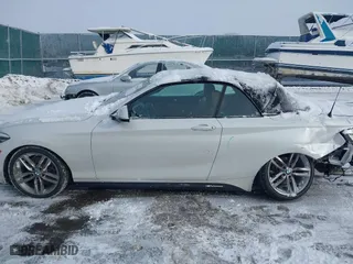 2018 BMW 2 Series 230i xDrive with VIN WBA2K1C52JVB64595, listed as a IAAI auction lot 41604748 with 47,461 mi miles. Bid and sale history available at carsss.com. Image 15.