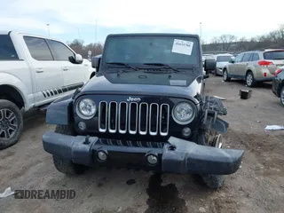 2016 Jeep Wrangler Unlimited 75th Anniversary with VIN 1C4BJWEG1GL221873, listed as a IAAI auction lot 41635788 with 148,493 mi miles. Bid and sale history available at carsss.com. Image 13.