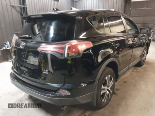 2018 Toyota RAV4 LE with VIN 2T3BFREV7JW768376, listed as a IAAI auction lot 41864571 with 292,147 mi miles. Bid and sale history available at carsss.com. Image 4.