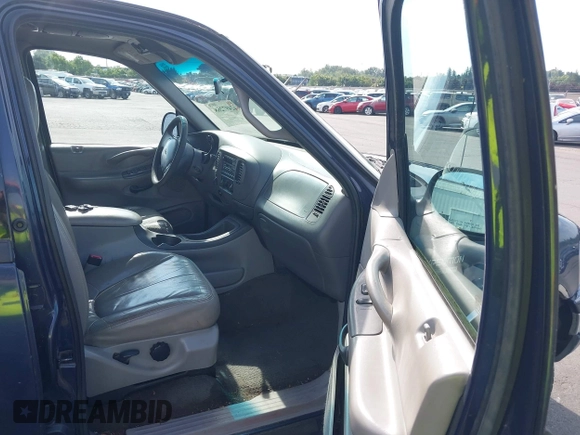 1999 Ford Expedition XLT with VIN 1FMPU18L4XLB75749, listed as a IAAI auction lot 42497268 with 253,765 mi miles and . Bid and sale history available at DreamBid. Image 5.