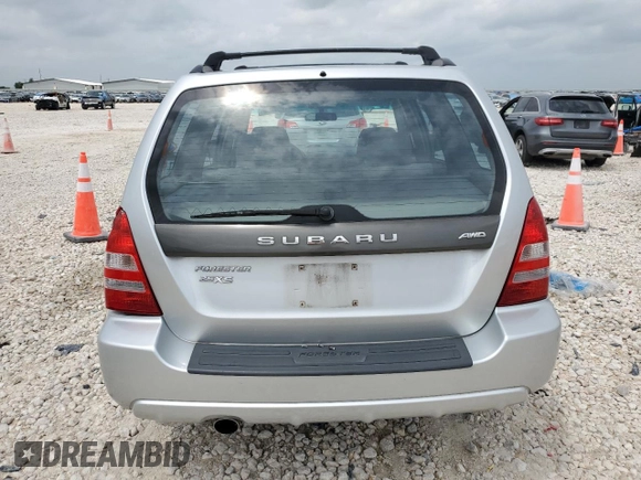 2003 Subaru Forester XS z VIN JF1SG65623G759979, wystawiony jako Copart lot #54721805 z przebiegiem 116 858 mil mil oraz Szkoda całkowita • Salvage title. Historia ofert i sprzedaży dostępna na DreamBid. Obrazek 6.