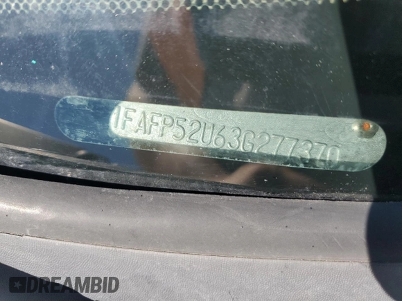 2003 Ford Taurus LX Standard z VIN 1FAFP52U63G277370, wystawiony jako Copart lot #56184345 z przebiegiem 115 778 mil mil oraz Szkoda całkowita • Salvage title. Historia ofert i sprzedaży dostępna na DreamBid. Obrazek 12.