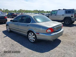 2004 Jaguar X-Type with VIN SAJEA51C04WD73023, listed as a IAAI auction lot 41874488 with 199,333 mi miles and . Bid and sale history available at DreamBid. Image 3.