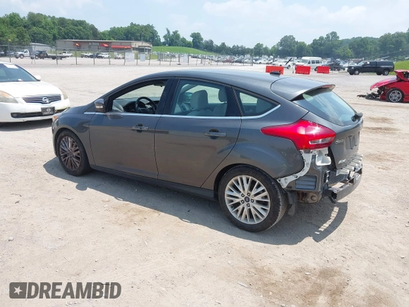 2016 Ford Focus Titanium with VIN 1FADP3N28GL299339, listed as a IAAI auction lot 42410154 with 78,245 mi miles and . Bid and sale history available at DreamBid. Image 3.
